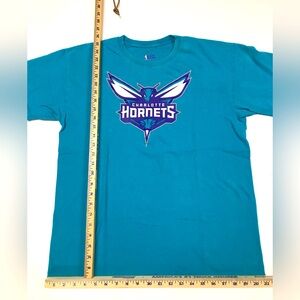 Charlotte Hornets short sleeved tshirt, size men’s L.